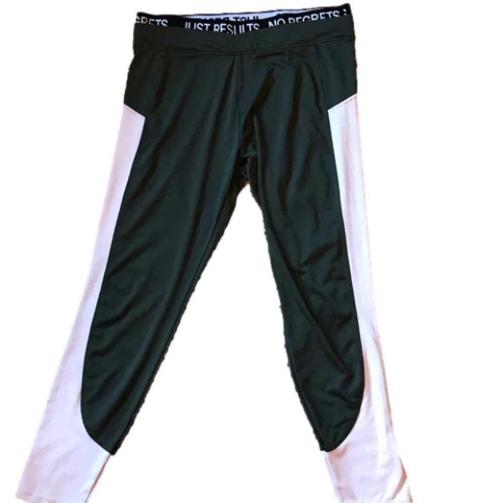 Workout leggings with motivational words on waistband.